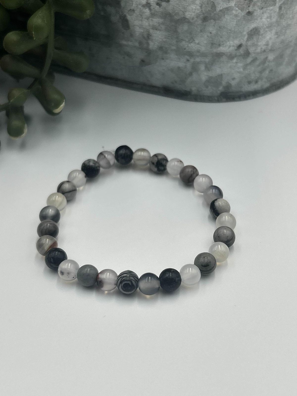 296ef7d817b2dbf74c9004b5dfe3667e Natural Black Picasso Bracelet - Image 1